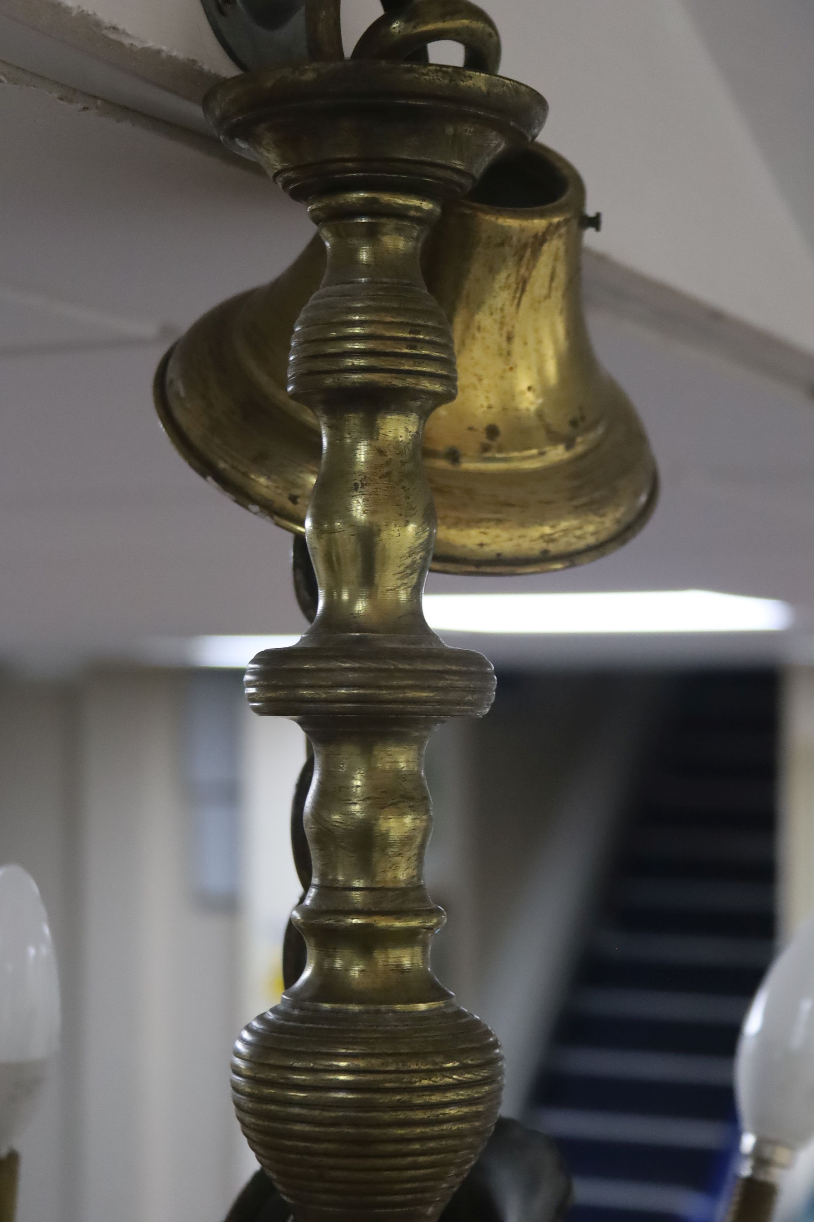 A 19th century Dutch brass six-light electrolier with star-shaped base and drop